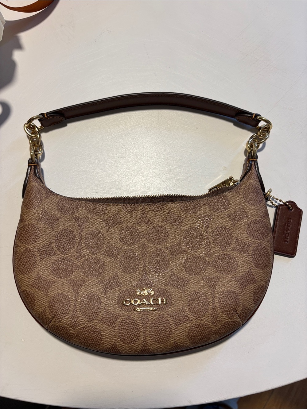 Coach Brown Signature Crescent Shoulder Bag with Gold Hardware